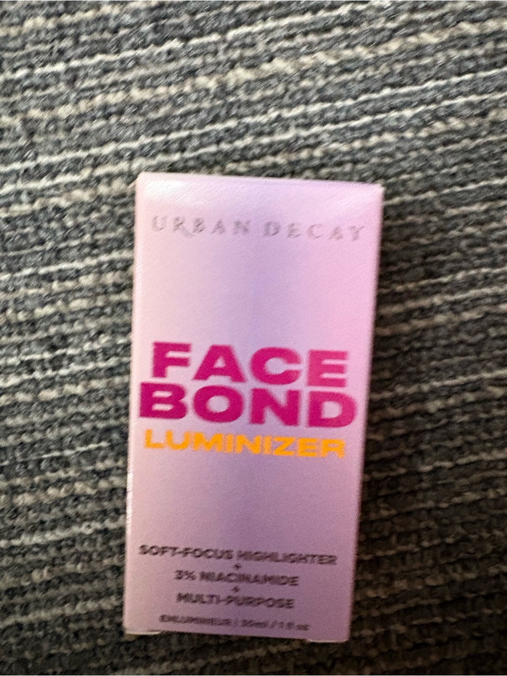 Urban Decay Face Bond Luminizer - Pink and Yellow Text